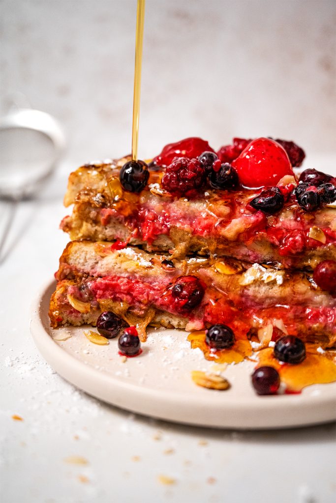 syrup pour over Vegan French Toast stuffed with raspberries and almond butter