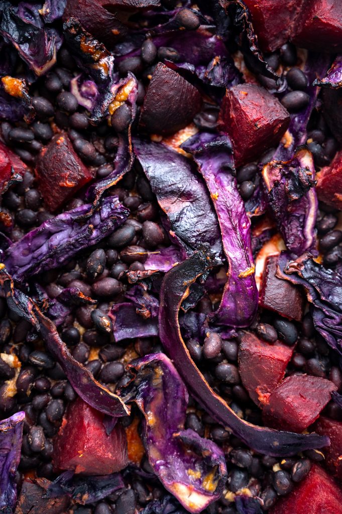 Close up of the miso red cabbage, beetroot and blacks once it has just come out of the oven. As a flat lay.