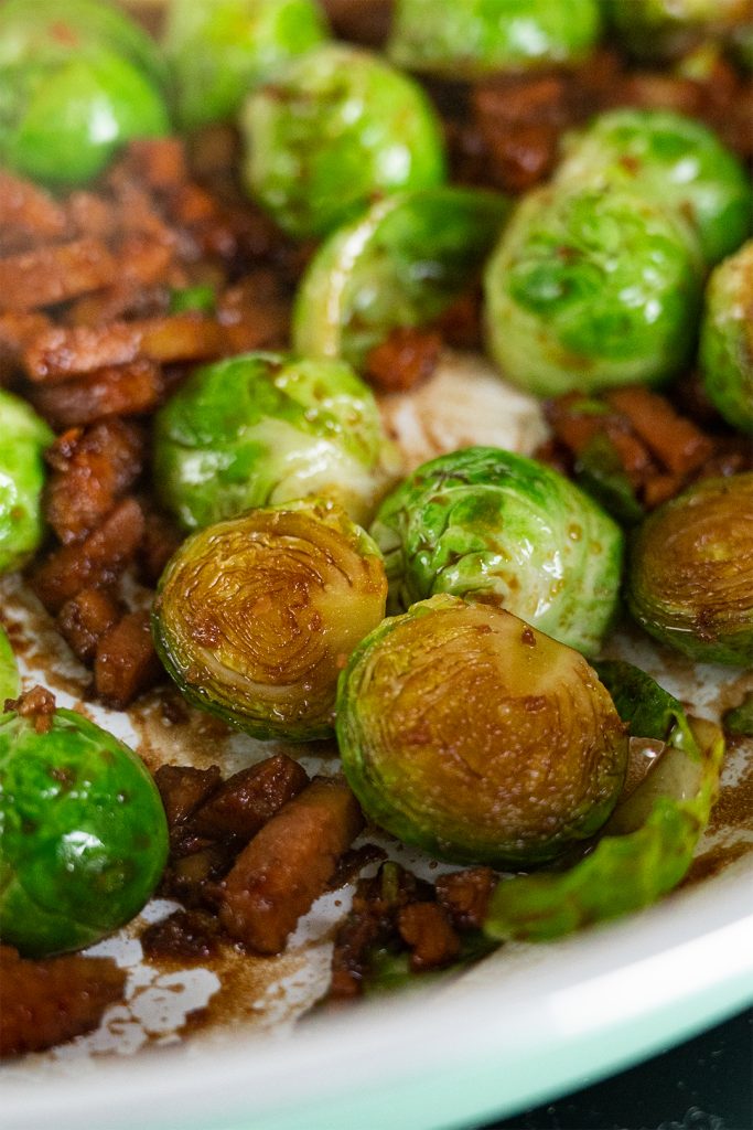 bowl of marmite and vegan bacon Brussels sprouts side dish